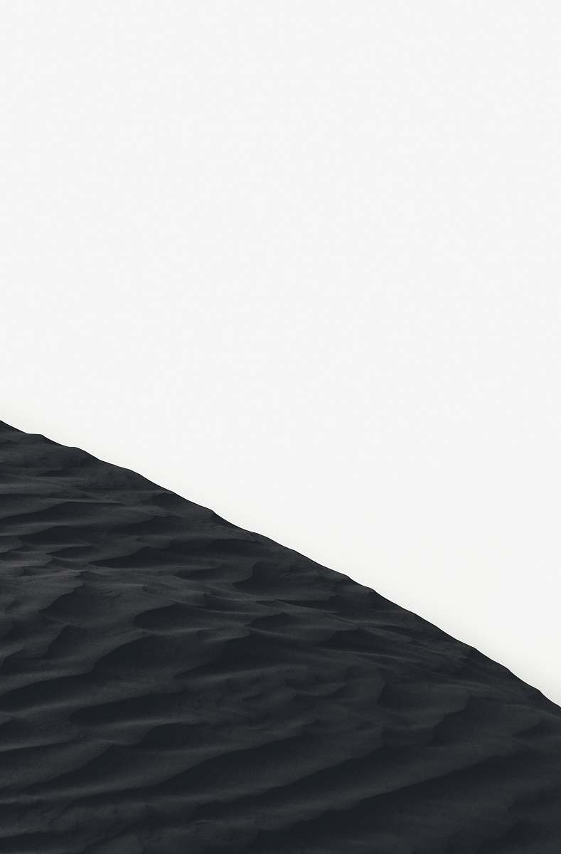 sand dune grayscale photo of sand dunes outdoors
